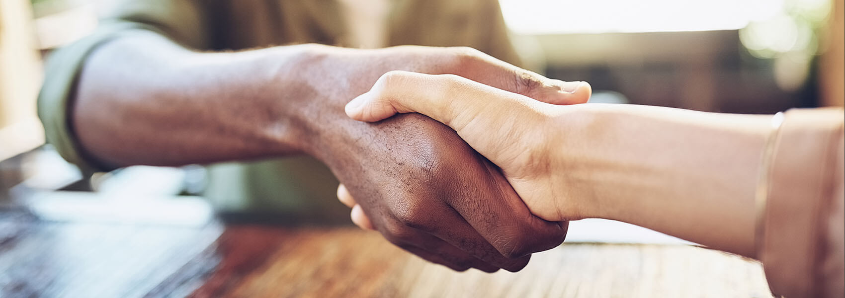 two people shaking hands