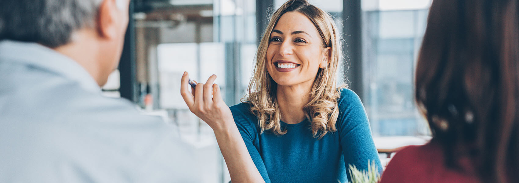 smiling woman in a business meeting